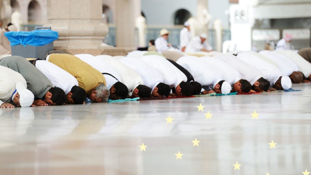 People prostrating in prayer