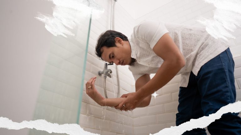 Man in washroom performing wudoo