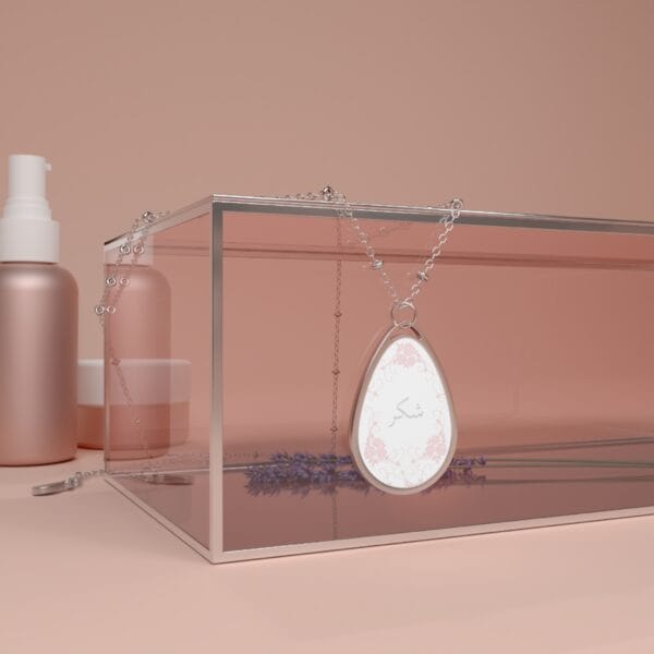 shukr chain necklace hanging on a jewelry box-kinda thing